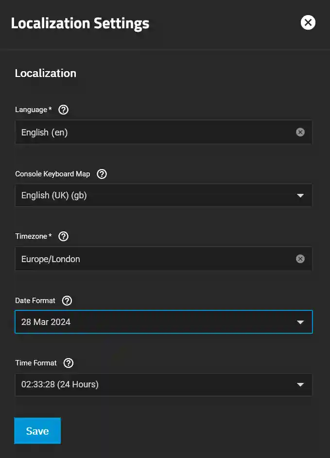 TrueNAS SCALE localization settings screen with options to select language, console keyboard map, timezone, date format, and time format.