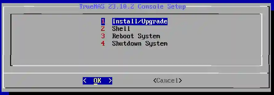 TrueNAS 23.10.2 Console Setup screen with options for Install/Upgrade, Shell, Reboot System, and Shutdown System. Install/Upgrade selected.
