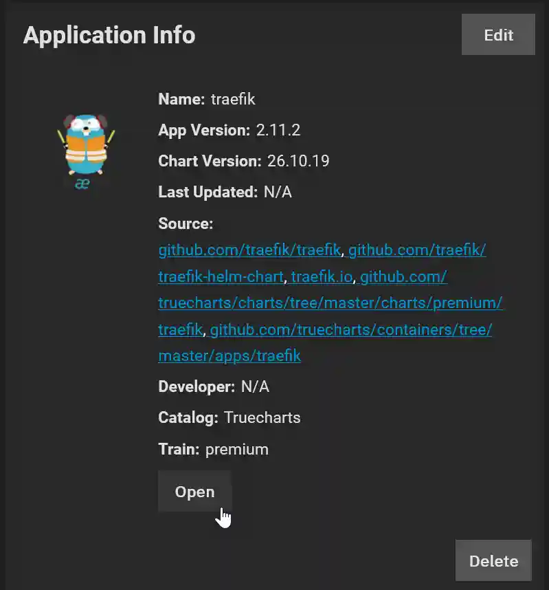 Screenshot of an 'Application Info' screen with a mascot resembling a bee in a traffic cone, representing the application named 'traefik'. It shows details like App Version 2.11.2, Chart Version 26.10.19, with sources listed from multiple GitHub repositories. The developer is not available, and the application is listed under the Truecharts catalog marked as premium. An 'Open' button is highlighted at the bottom with a cursor icon indicating a click option, and a 'Delete' button is at the bottom right.